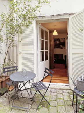 Chic neighborhood charming courtyard studio 7th
